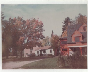 1970s photo of the caretaker house and red guest house at Ives Lake